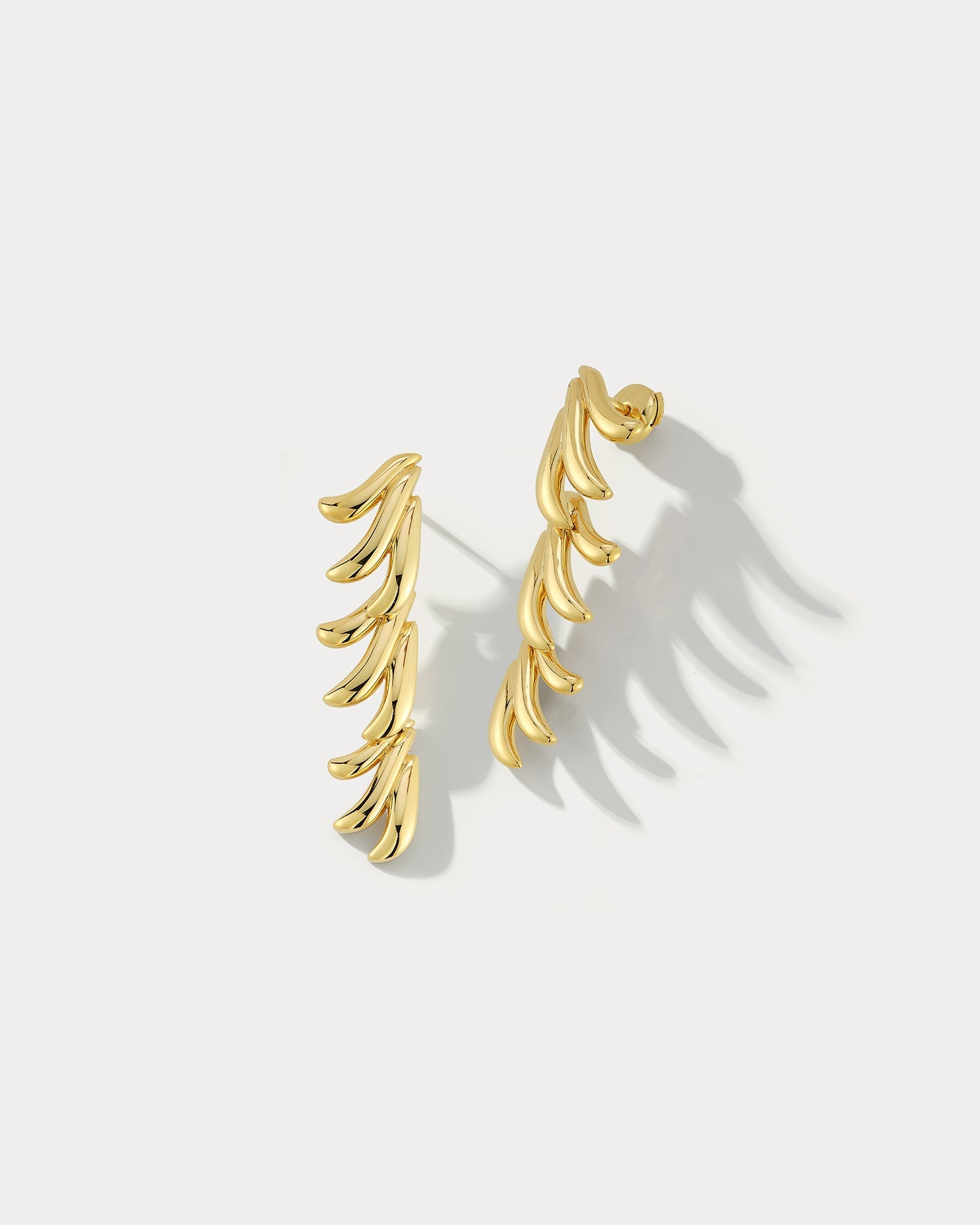 Ammrada yellow gold hanging earrings with intricate design, showcasing elegant dangle style and craftsmanship.