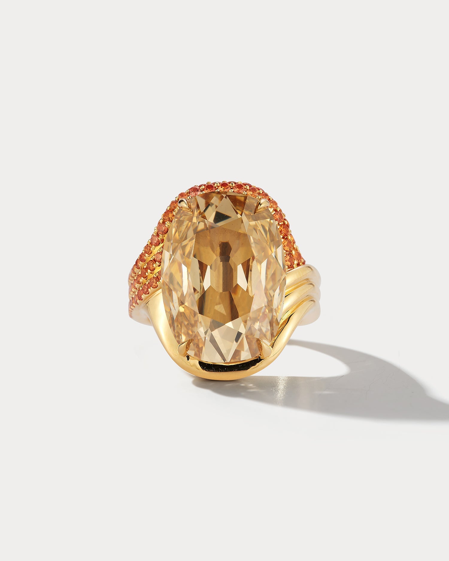 Ammrada 12.35ct diamond ring with 1.55ct orange sapphires, featuring a stunning design and sparkling gemstones.