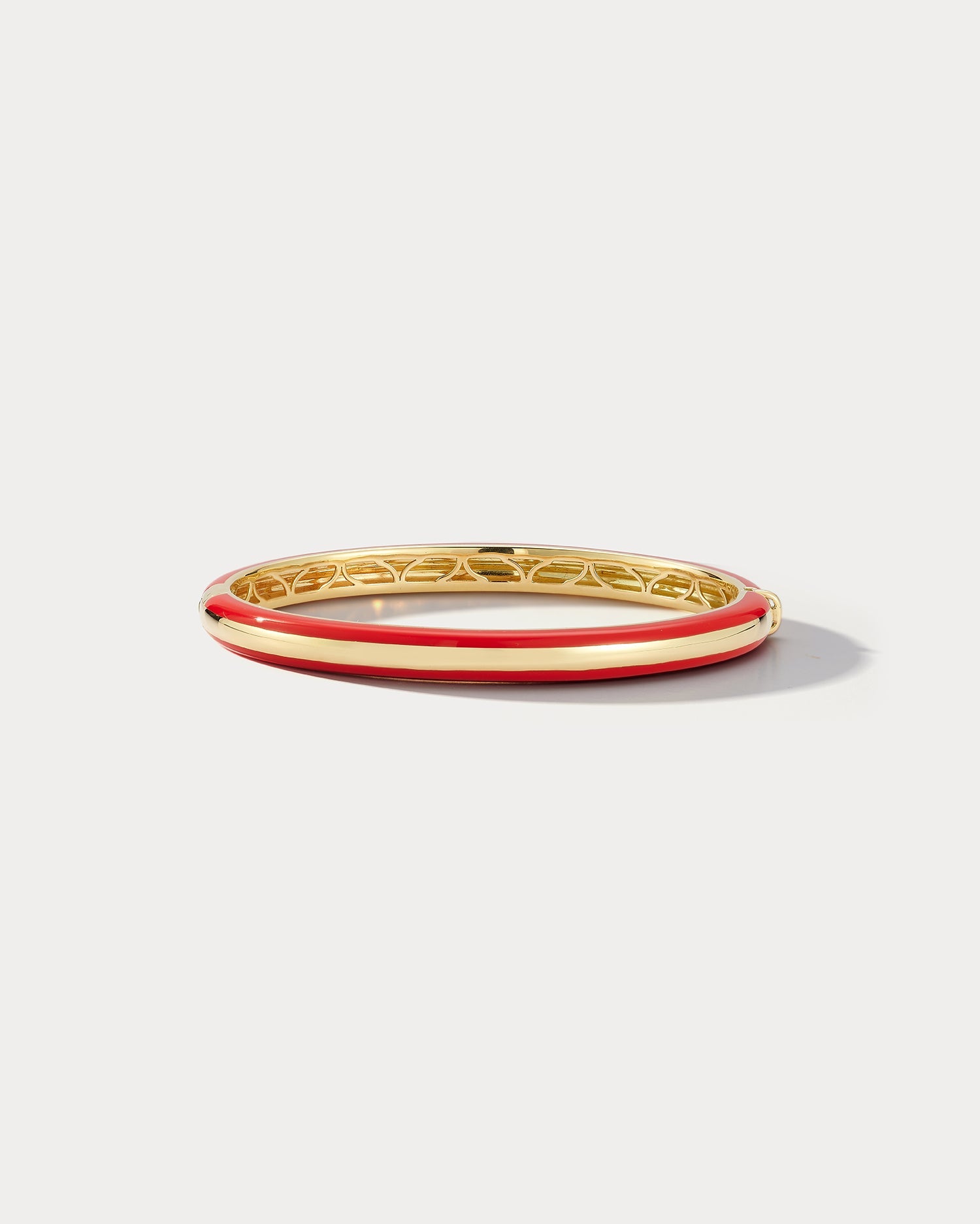 Ammrada AM-48-YGRD gold-tone bangle bracelet with intricate design on a white background