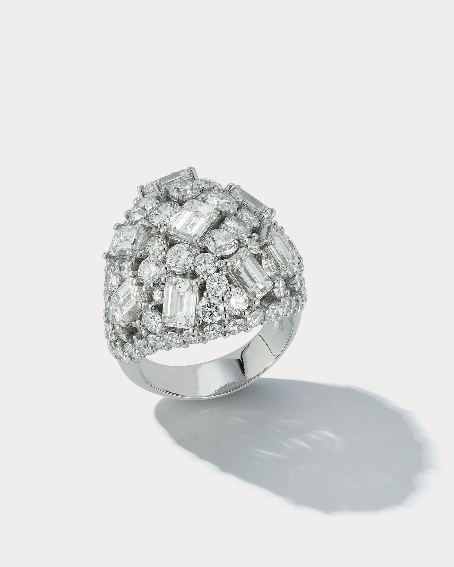Ammrada Plat Dome Cluster Ring featuring 8 emerald-cut GIA-certified diamonds totaling 4.19ct and 72 round diamonds totaling 4.92ct.