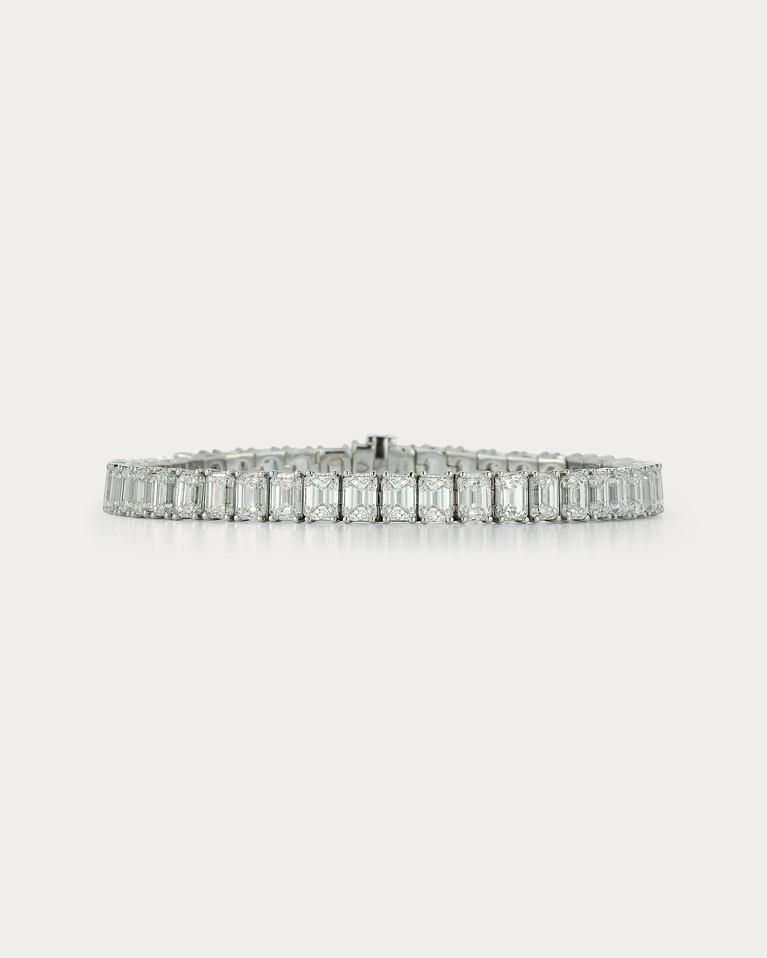 Ammrada platinum emerald-cut tennis bracelet with 48 diamonds totaling 18.46ct, GIA G-I VS-VVS clarity, elegant jewelry piece