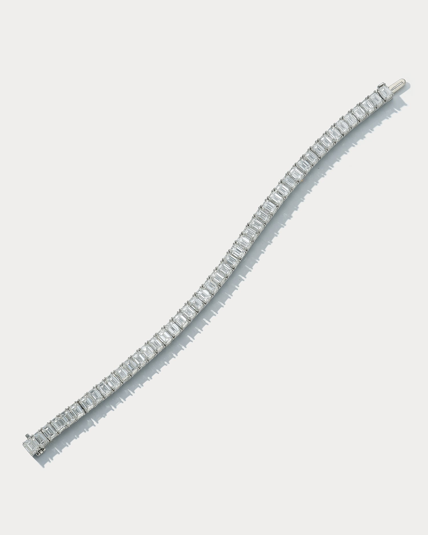 Ammrada platinum emerald-cut tennis bracelet with 48 diamonds totaling 18.46ct, GIA G-I VS-VVS clarity, elegant jewelry accessory.
