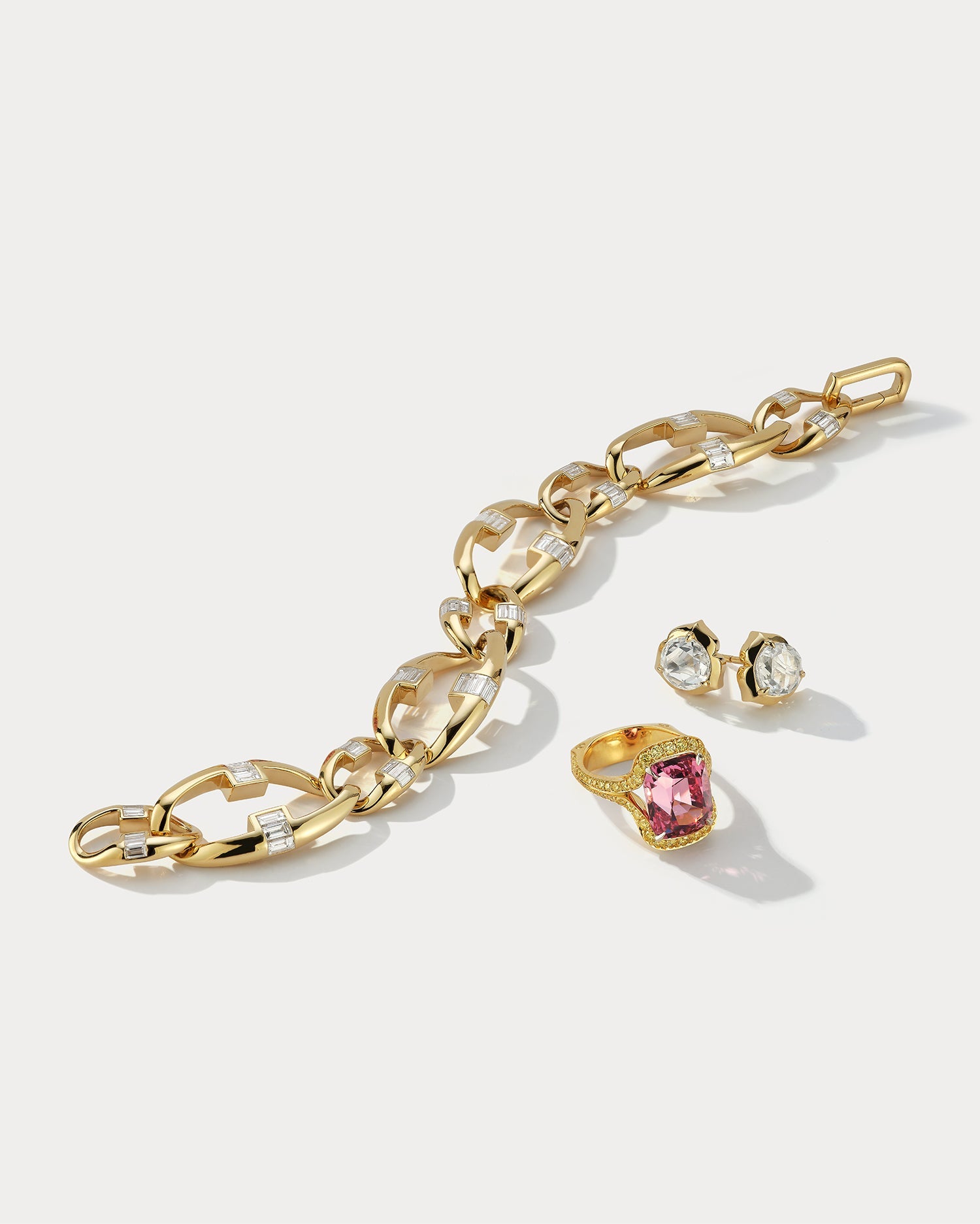 Ammrada Peachy Pink Spinel ring featuring a vibrant pink spinel gemstone set in a sleek band, displayed on a neutral background.