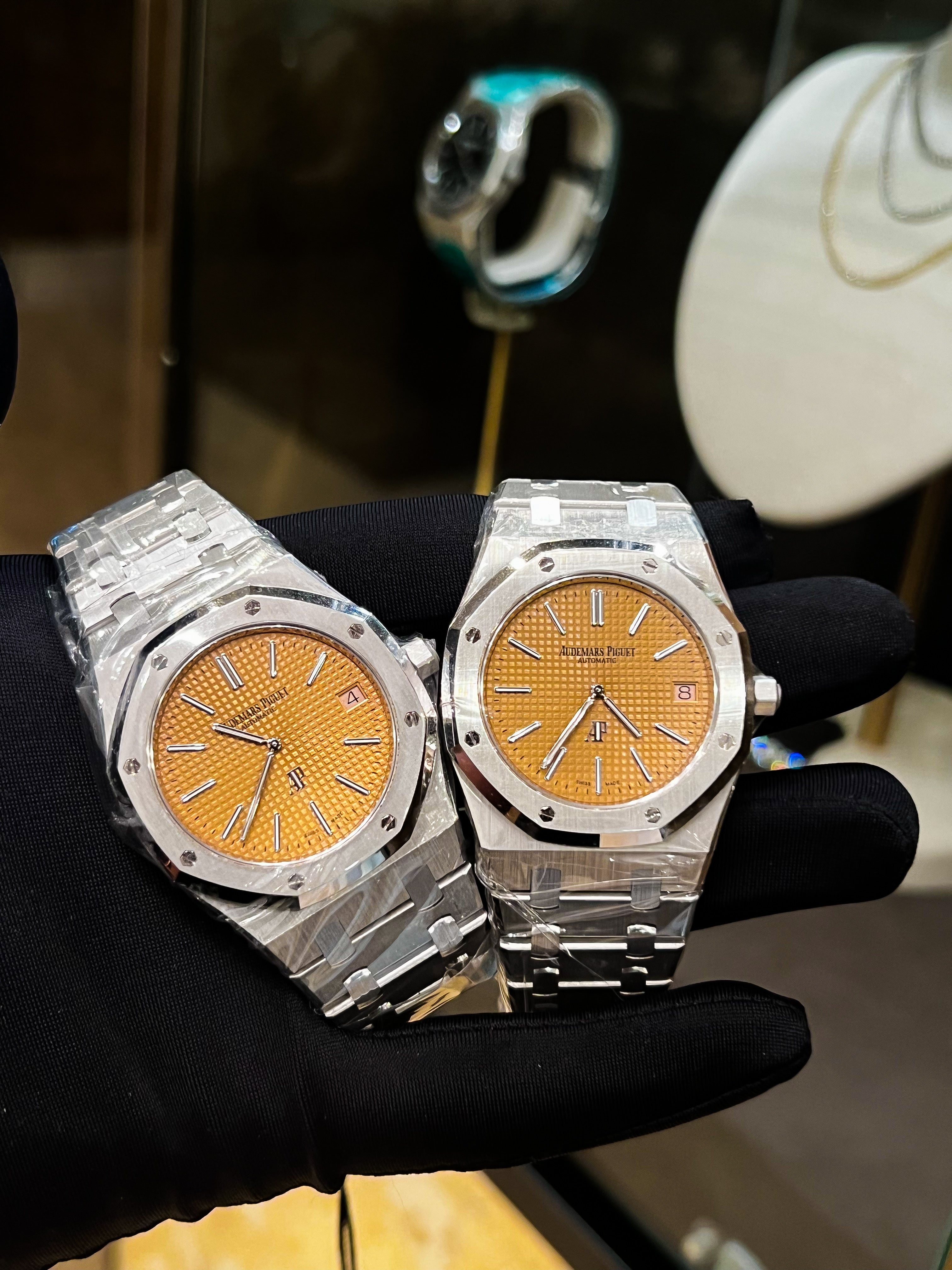 Audemars Piguet Royal Oak Jumbo Salmon dial luxury watch with stainless steel case and bracelet, showing the iconic octagonal bezel.