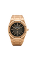 Audemars Piguet Royal Oak Jumbo watch with 18K rose gold case and bracelet, featuring a sleek, ultra-thin design and octagonal bezel.
